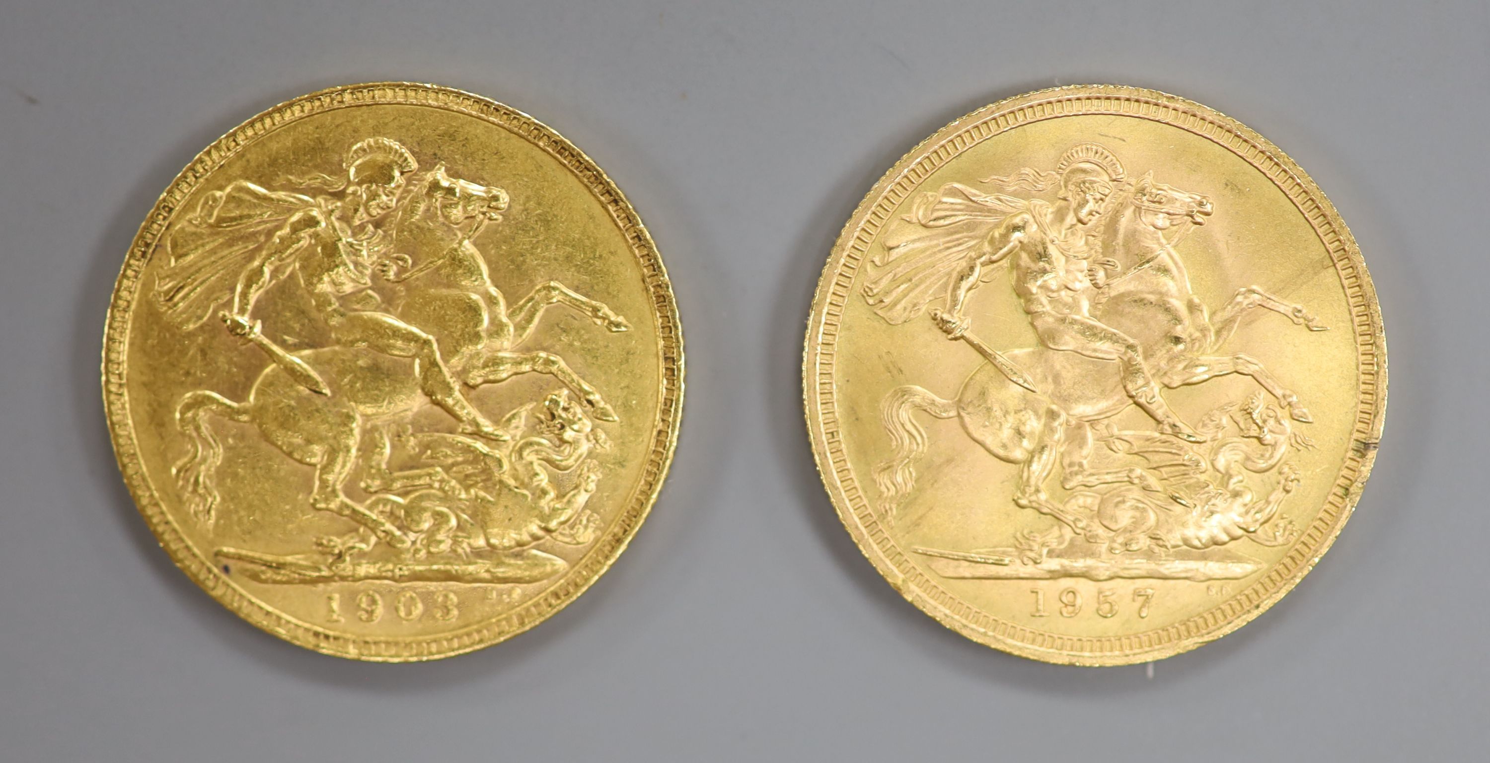 Two gold sovereigns, 1903 & 1957.